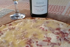 Avec une tarte flambée